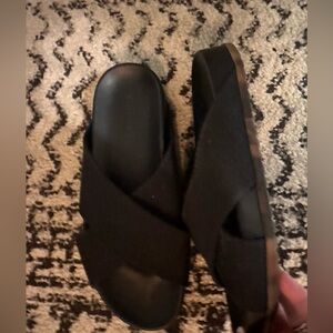 Rothy’s Size 8 - black slip on sandals in really good condition